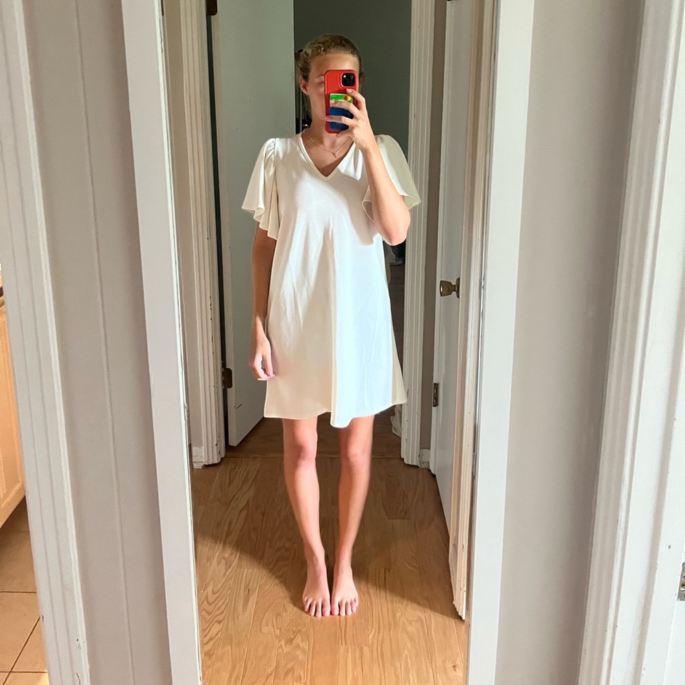 super cute white dress! from a hometown boutique, only worn once!